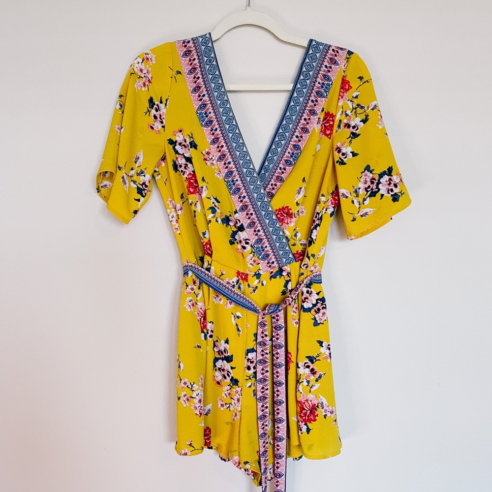 Francesca’s Yellow Floral V-Neck Romper